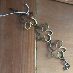 Brass tone floral link bracelet